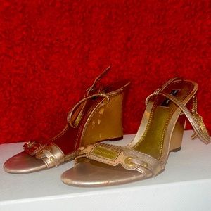 Dolce & Gabbana rose gold metallic wedge . Size 39